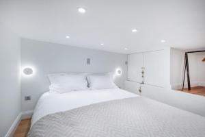 Ένα ή περισσότερα κρεβάτια σε δωμάτιο στο Aristotelous Chris Studio