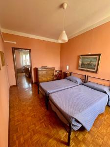 Letto o letti in una camera di B&B Casanonni Borgo Angeli