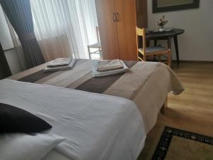 Postel nebo postele na pokoji v ubytování House Zlatko