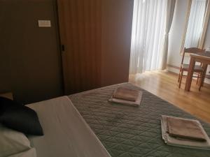 Postel nebo postele na pokoji v ubytování House Zlatko