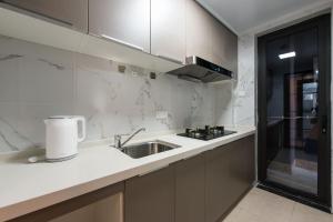 Fotografie z fotogalerie ubytování WESU Weisu Service Apartment - Shenzhen University Town Tanglang Metro Station Branch v destinaci Šen-čen