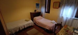 Postel nebo postele na pokoji v ubytování Veniserelax