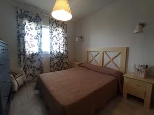 Postel nebo postele na pokoji v ubytování Precioso apartamento con terraza y vistas al mar