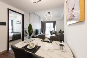 Posezení v ubytování WESU Weisu Service Apartment - Shenzhen University Town Tanglang Metro Station Branch + 37 fotografií
