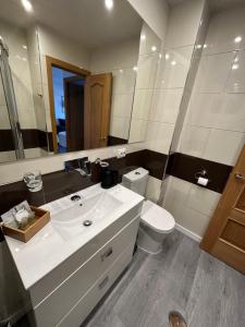 Kúpeľňa v ubytovaní Apt céntrico con vistas y piscinas