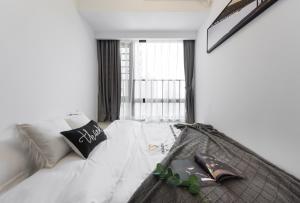 Fotografie z fotogalerie ubytování WESU Weisu Service Apartment - Shenzhen University Town Tanglang Metro Station Branch v destinaci Šen-čen