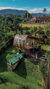a large object is on display in a field at Veluvana Bali in Sidemen
