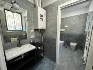 Koupelna v ubytování Loft Matteotti - Studio in centro