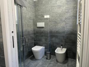 Koupelna v ubytování Loft Matteotti - Studio in centro