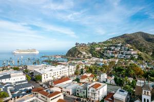 a city with a cruise ship in the ocean at Casa Mariquita Hotel by Omeo in Avalon