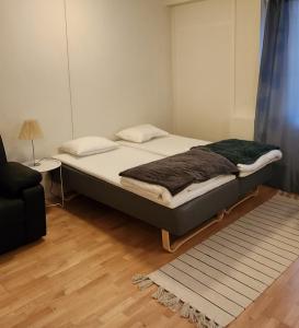 Postel nebo postele na pokoji v ubytování Vandrarhemmet Eken