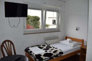 Posteľ alebo postele v izbe v ubytovaní Favela Hostel