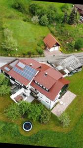 an overhead view of a house with a solar roof at Pension Haus-Sommerberg in Baiersbronn