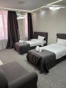 Postel nebo postele na pokoji v ubytování Hotel DavidL