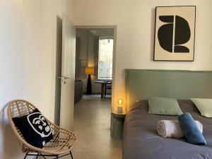 Posedenie v ubytovaní Appartement avec ventilateurs proche du Palais des Papes