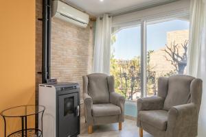 Posedenie v ubytovaní Bonita casa en urbanización privada muy cerca del mar y de Alicante