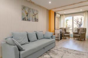 Posedenie v ubytovaní Bonita casa en urbanización privada muy cerca del mar y de Alicante