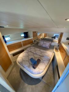 an overhead view of a bed in a boat at - DIVALI - Duerme en un Confortable Yate en Barcelona in Barcelona