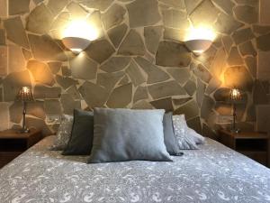 Postel nebo postele na pokoji v ubytování Casa Piedra Mallorca