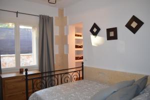 Postel nebo postele na pokoji v ubytování Casa Piedra Mallorca