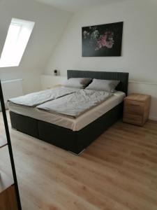 Un pat sau paturi într-o cameră la Altes Gesellenhaus