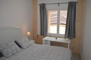 Postel nebo postele na pokoji v ubytování Casa Piedra Mallorca