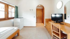 Μια τηλεόραση ή/και κέντρο ψυχαγωγίας στο Hotel Corno Bianco