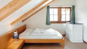 Ένα ή περισσότερα κρεβάτια σε δωμάτιο στο Hotel Corno Bianco