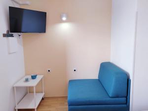 TV a/nebo společenská místnost v ubytování Guesthouse Resan