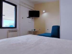 TV a/nebo společenská místnost v ubytování Guesthouse Resan