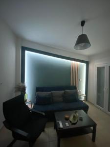 Posezení v ubytování Billys apartment Selianitika