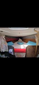 Ein Bett oder Betten in einem Zimmer der Unterkunft El barquito de arrecife