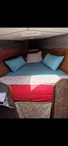 Ein Bett oder Betten in einem Zimmer der Unterkunft El barquito de arrecife