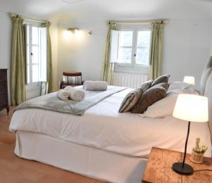 Posteľ alebo postele v izbe v ubytovaní B&B Can Jan