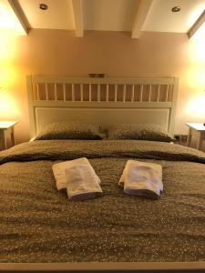 Posteľ alebo postele v izbe v ubytovaní Eretria’s Villa