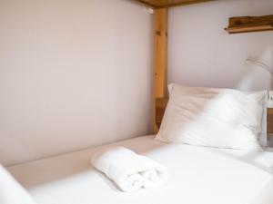 Postel nebo postele na pokoji v ubytování Castaway