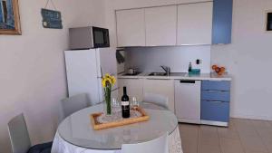 Kuchyň nebo kuchyňský kout v ubytování apartment istria