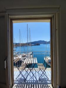 a view of a marina from a window at Monolocale La Darsena in Portoferraio