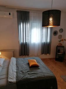 Postel nebo postele na pokoji v ubytování Mala Bella