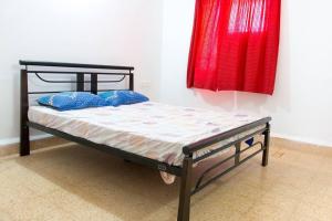 A bed or beds in a room at Stay at Colva Beach