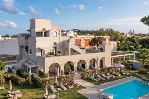 an aerial view of a villa with a swimming pool at Insula Boutique Hotel in Procida