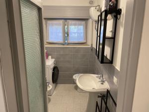 Koupelna v ubytování Giardino Ovest - a pochi passi dal mare