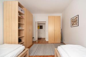 Cama o camas de una habitación en Im Herzen von Wien