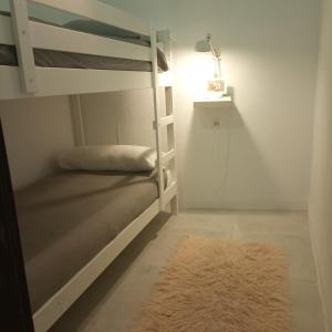 Postel nebo postele na pokoji v ubytování Villa Merced