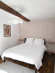 Postel nebo postele na pokoji v ubytování Appartement vue sur château-fort 3 étoiles