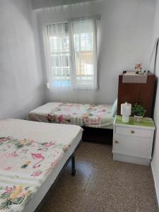 Posteľ alebo postele v izbe v ubytovaní Sun & Sea 3 Bedroom Apartment de Grau