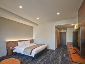 Roynet Hotel Seoul Mapoにあるベッド
