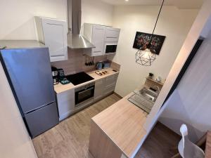 Kuchyňa alebo kuchynka v ubytovaní Appartement à 15min de paris