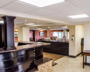 a lobby with a bar in a hotel at Quality Inn Riverfront in Harrisburg