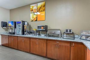 a kitchen with a counter with a coffee maker at Comfort Inn South in Kingsport